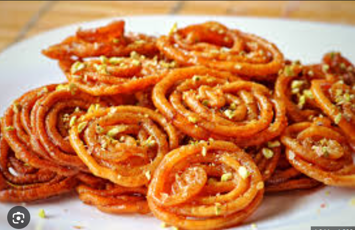 Steamed Mantoo dumplings with yogurt sauce